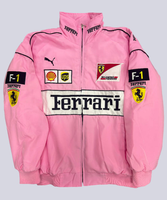 Pink racing suit with various logos on a dark surface